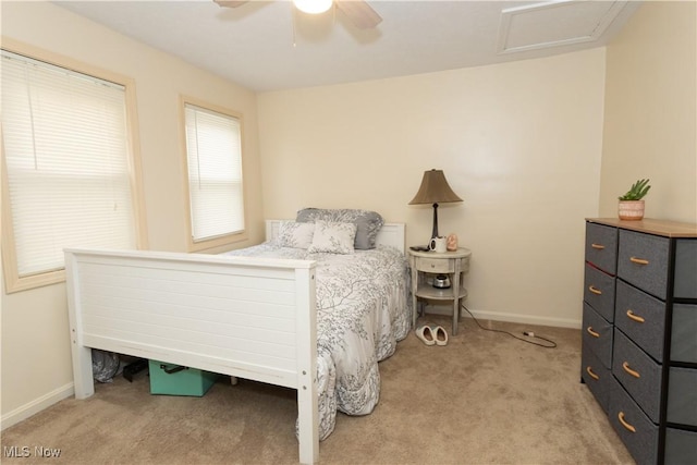 carpeted bedroom featuring ceiling fan