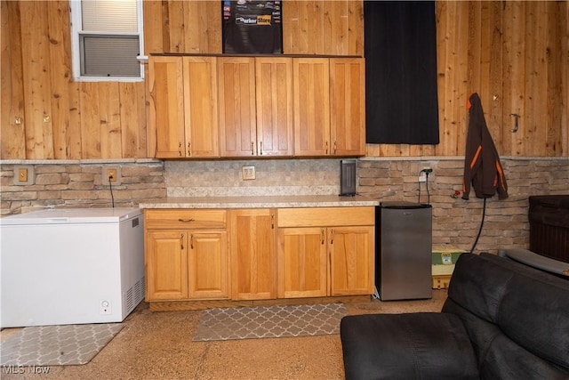 kitchen with refrigerator and stainless steel fridge