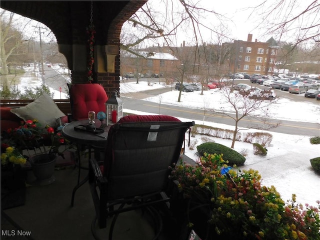 view of snow covered patio