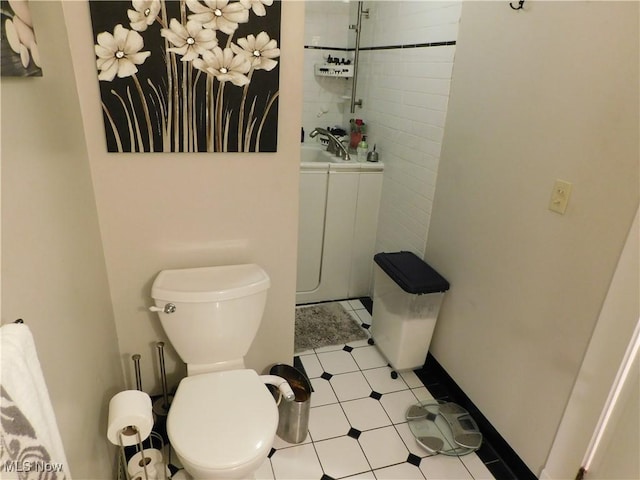 bathroom with toilet and sink