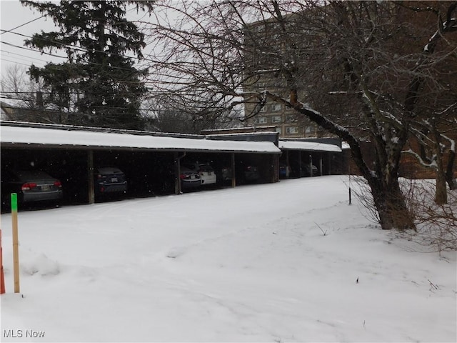 exterior space with a carport