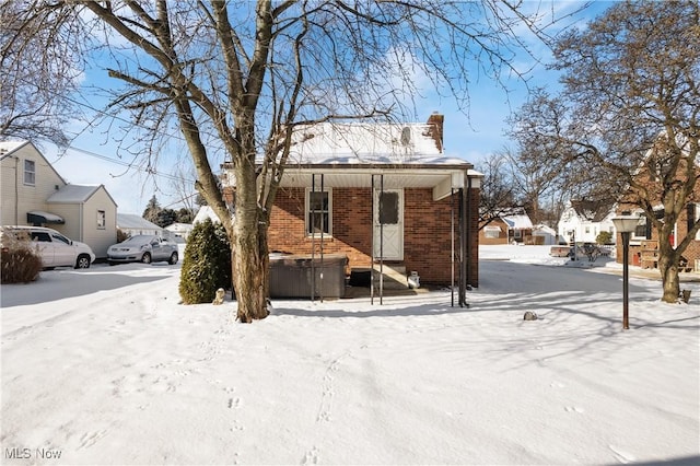 view of snow covered property