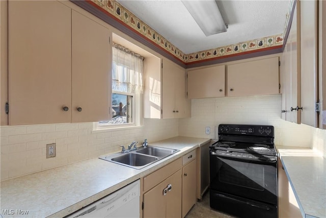 kitchen featuring black / electric stove, backsplash, sink, and cream cabinets