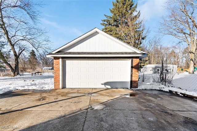 view of snow covered garage