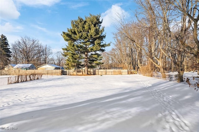 view of yard covered in snow