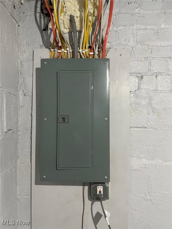 utility room featuring electric panel