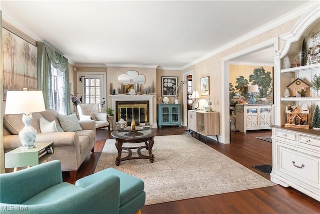 living room with dark hardwood / wood-style flooring and crown molding