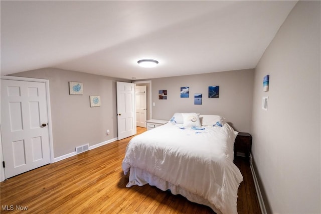 bedroom featuring light wood-type flooring