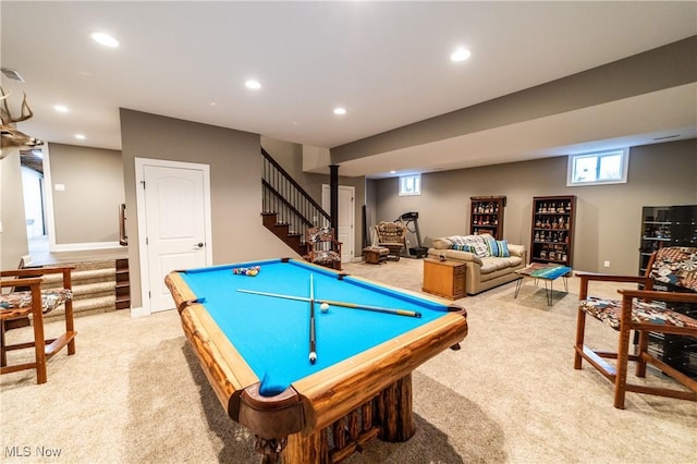 game room with light carpet, a wealth of natural light, and pool table