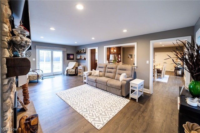 living room featuring dark hardwood / wood-style floors