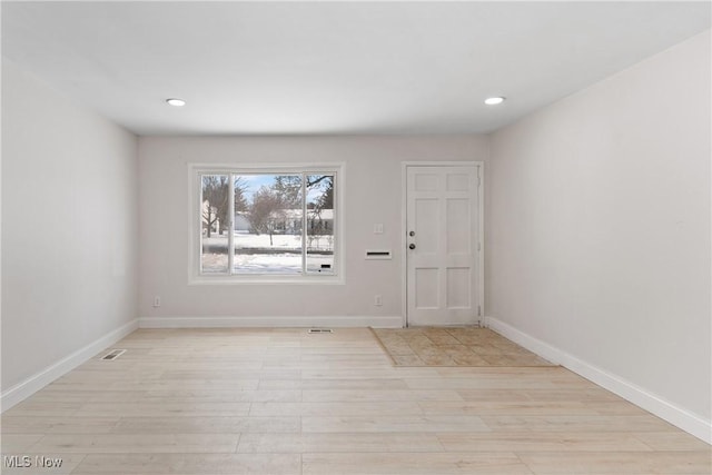 foyer entrance featuring light hardwood / wood-style floors