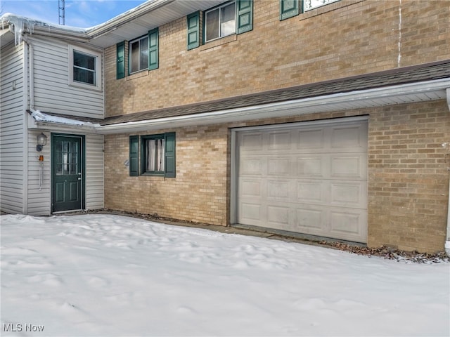 exterior space with a garage