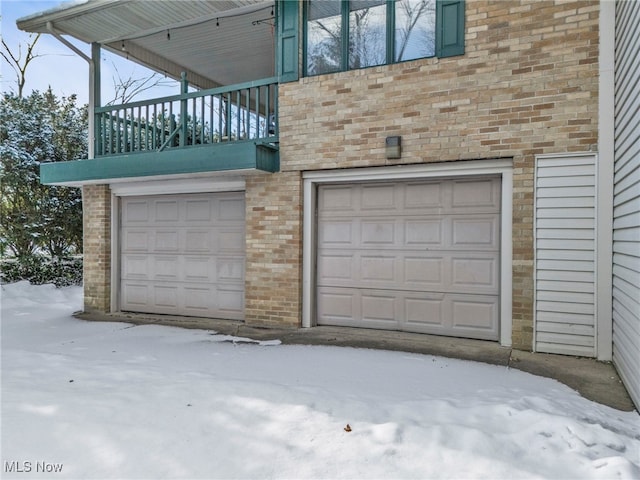 view of snow covered garage