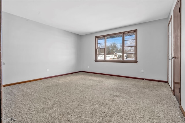 view of carpeted spare room