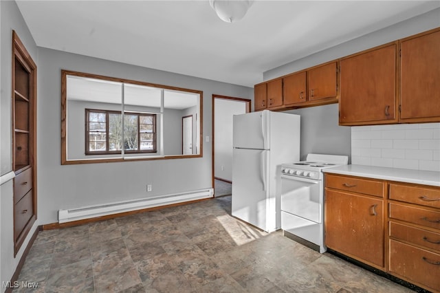 kitchen featuring backsplash, pendant lighting, white appliances, and a baseboard radiator