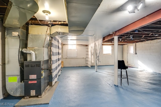 basement featuring heating unit