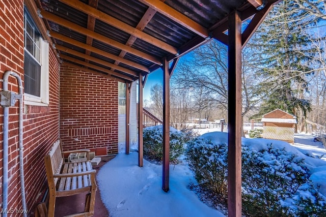 view of snow covered patio