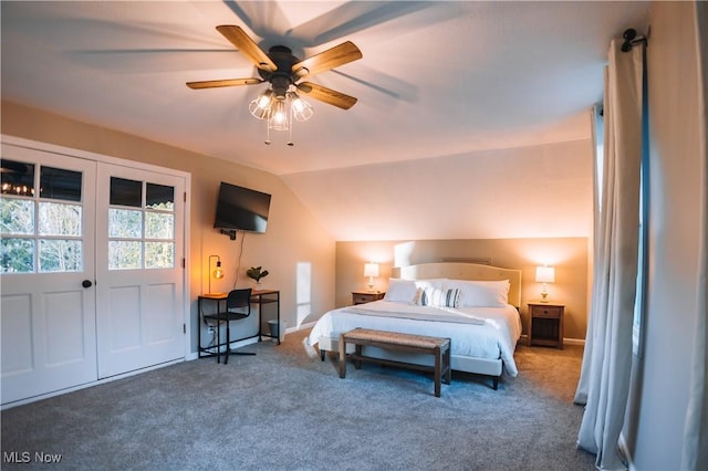 bedroom featuring ceiling fan, lofted ceiling, and carpet floors