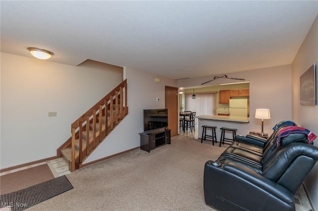 living room featuring light colored carpet