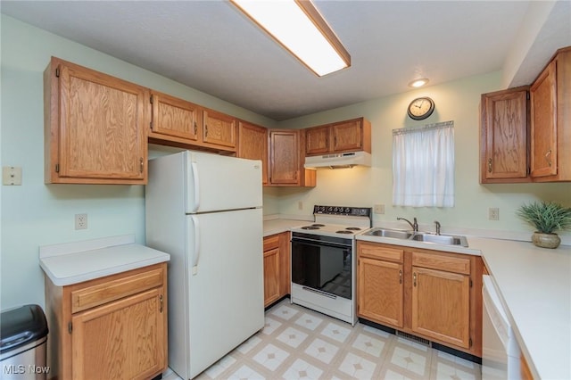 kitchen with sink and white appliances