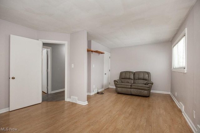 unfurnished room featuring light hardwood / wood-style flooring