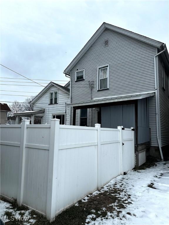 view of snow covered property