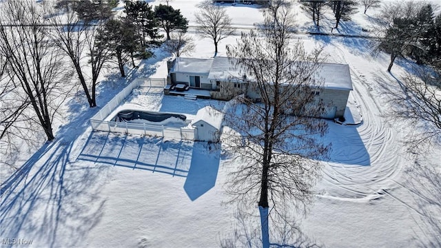 view of snow covered pool