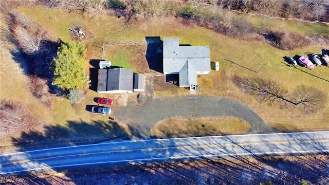 birds eye view of property featuring a rural view