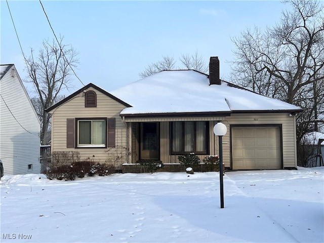 ranch-style home with a garage