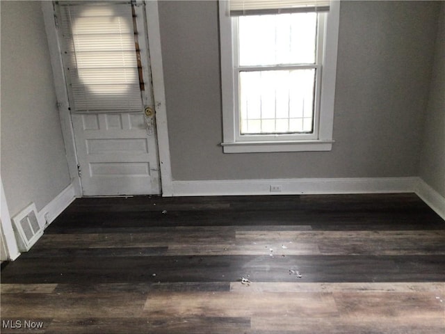 interior space featuring dark wood-type flooring