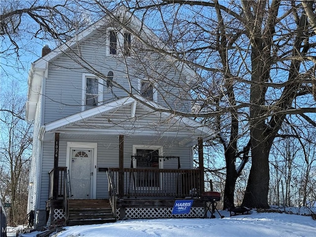 front of property featuring covered porch