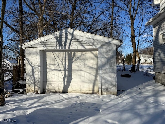 view of snow covered garage