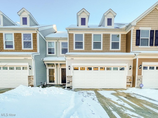 view of front of property with a garage