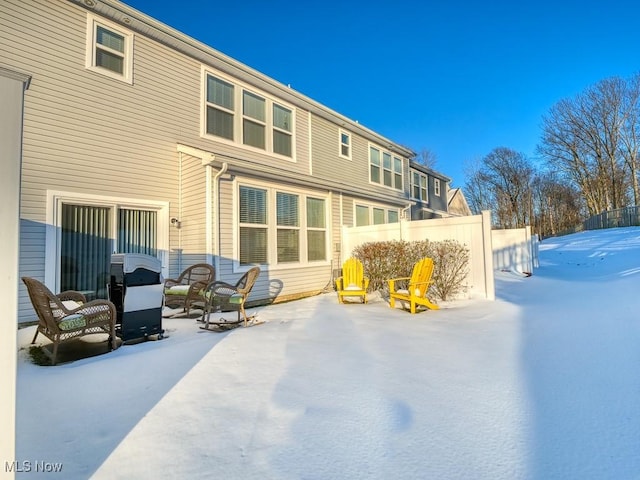 view of snow covered house