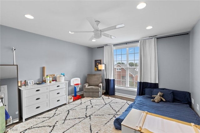 bedroom featuring ceiling fan and hardwood / wood-style floors