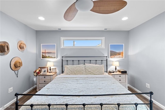 bedroom featuring ceiling fan and hardwood / wood-style floors