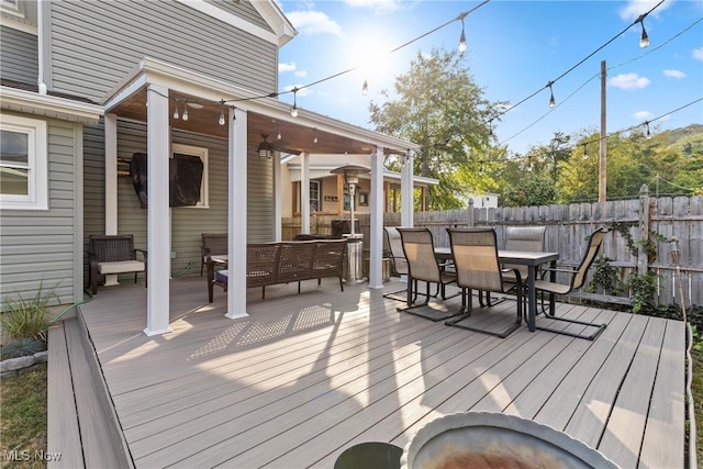 wooden terrace with ceiling fan