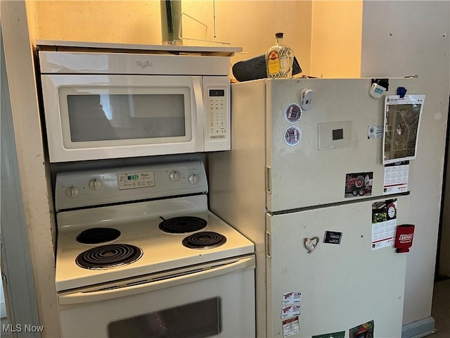 kitchen featuring white appliances