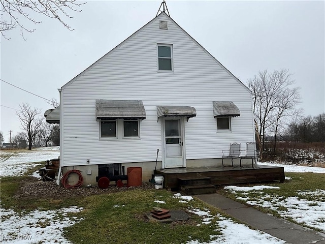 view of snow covered house