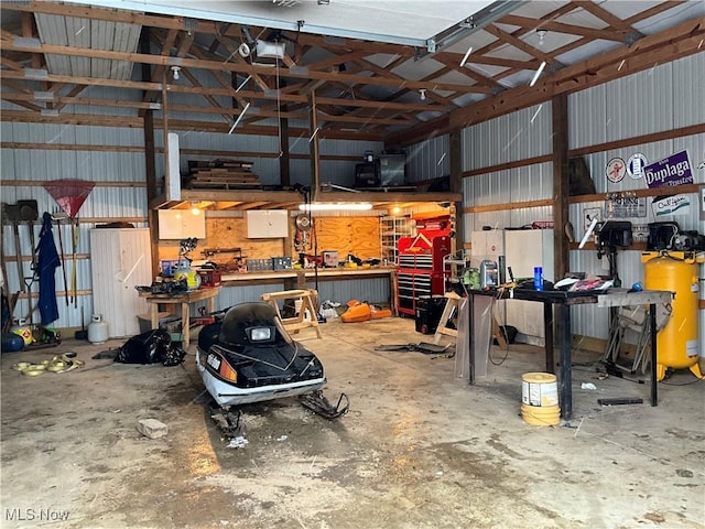 garage featuring a workshop area