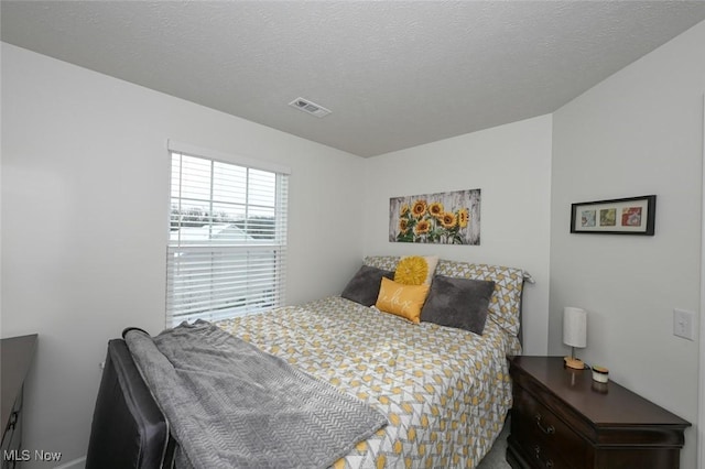 bedroom with a textured ceiling