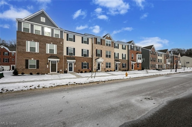 view of snow covered property