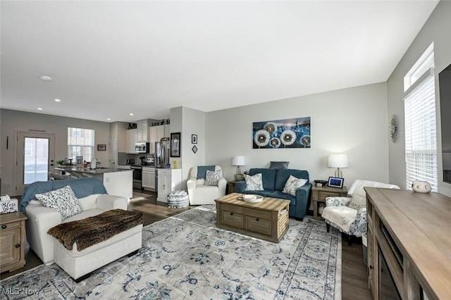 living room with light hardwood / wood-style floors