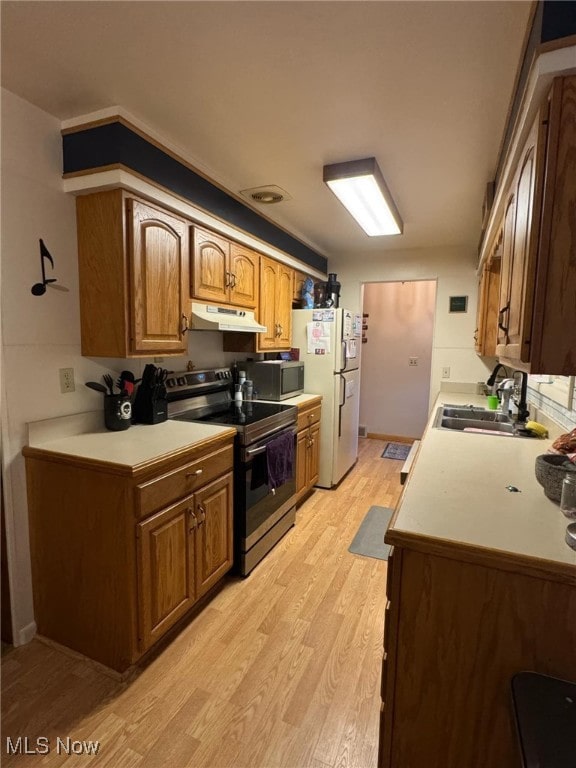 kitchen featuring light hardwood / wood-style floors, sink, and stainless steel appliances