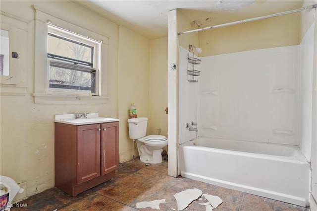 full bathroom with toilet, vanity, and bathing tub / shower combination