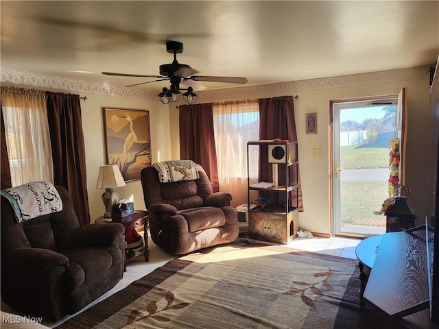 interior space with ceiling fan and a healthy amount of sunlight