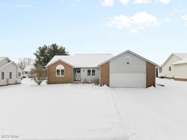 single story home with a garage