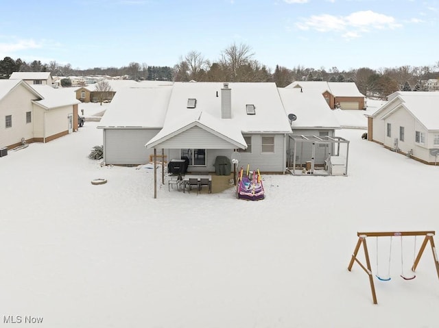 view of snow covered property