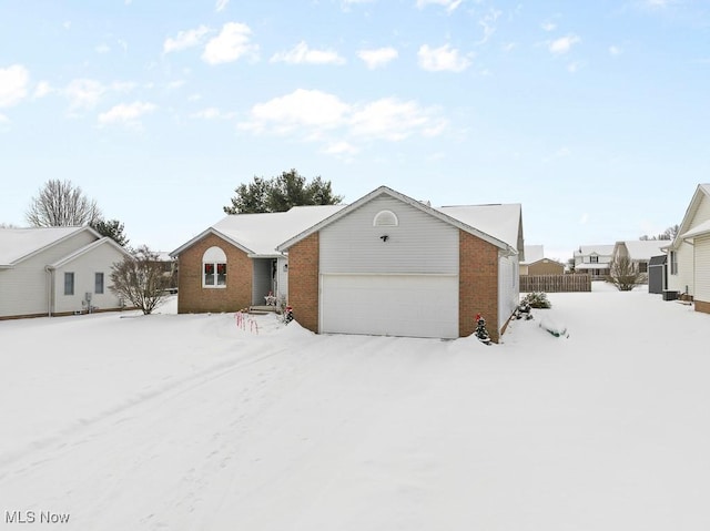 single story home featuring a garage