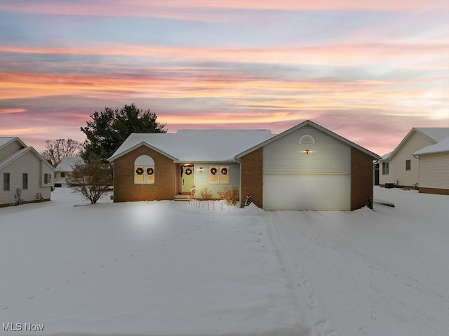 single story home with a garage